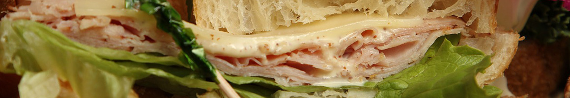 Eating Sandwich at La Bou Rocklin restaurant in Rocklin, CA.